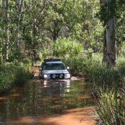 NT Indigenous Tours vehicle fording Tolmer creek