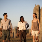 Tess Atie with couple at termite mounds